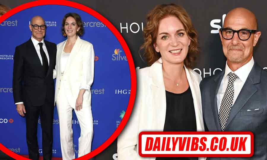 Felicity Blunt smiling with her husband Stanley Tucci at a public event